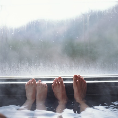 Picture of feet on window in hot tub